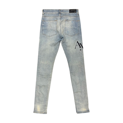 Used Amiri Staggered Embroidered Logo Jeans - Sz 31